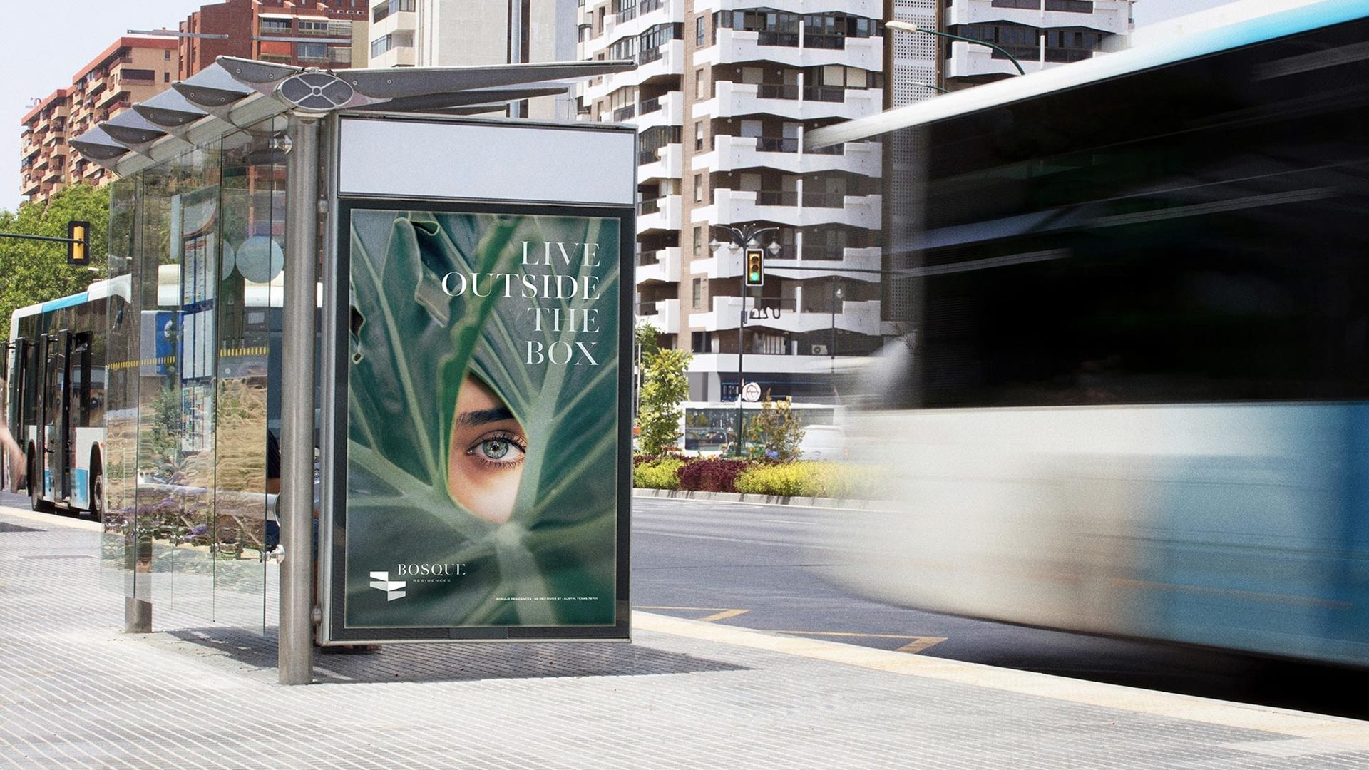 LIVE OUTSIDE THE BOX on a transit shelter in Austin