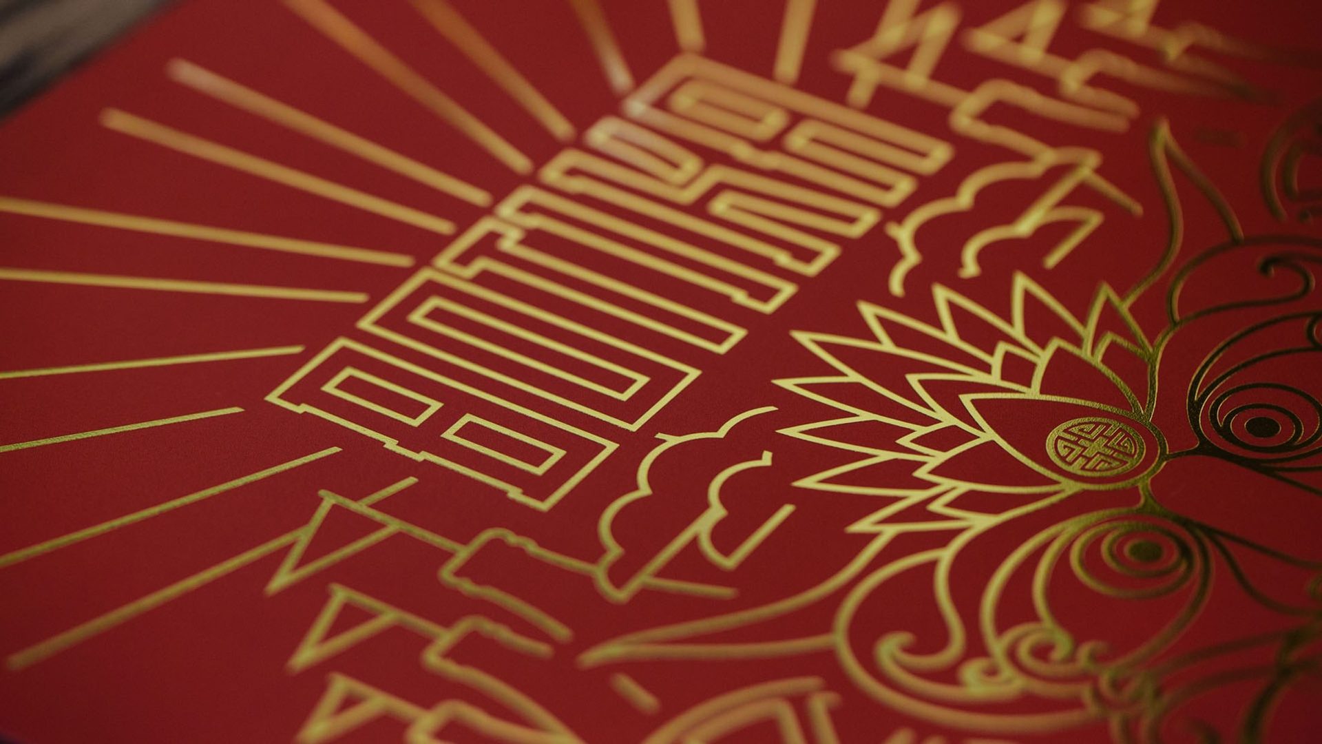 Gold linework from the identity, applied at scale