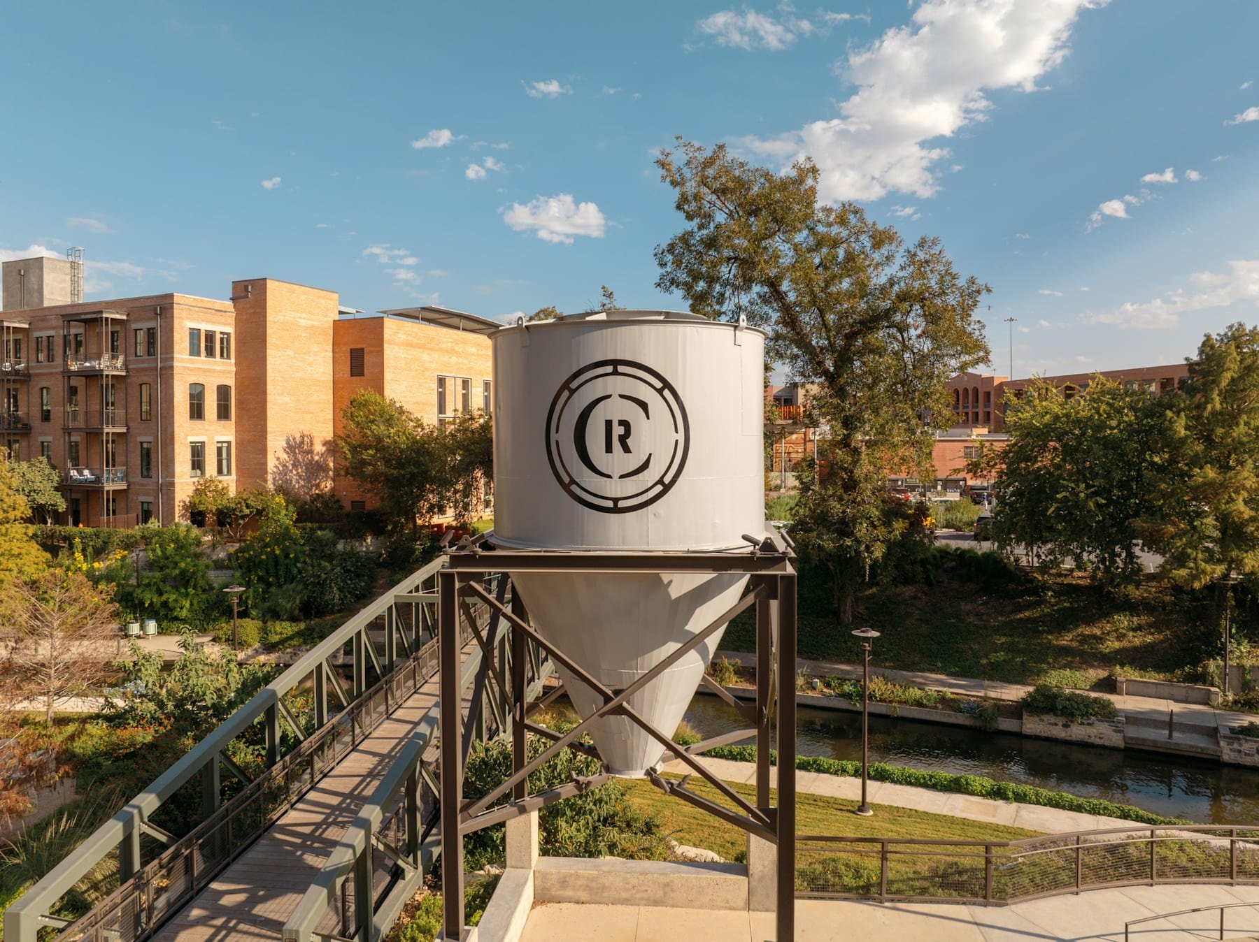 The white riverside silo carrying the circular CR mark