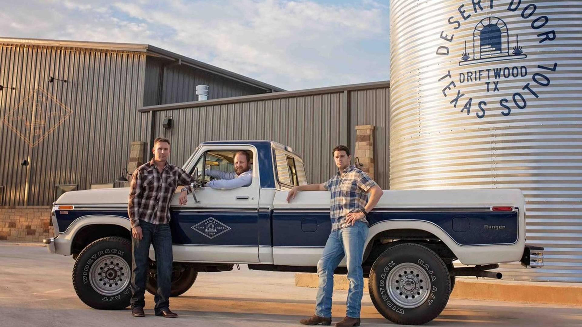 The Desert Door founders with the branded truck at the Driftwood distillery
